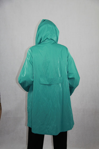 Hopsack Kurzmantel in Türkis mit Rückriegel und Kapuzenkragen. Wasserabweisendes Material.
